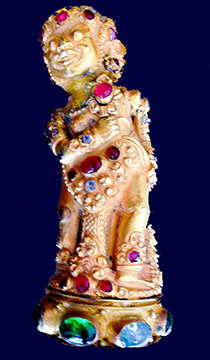 divi with rubies and other stones