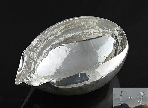 Hammered sterling silver libation cup.
