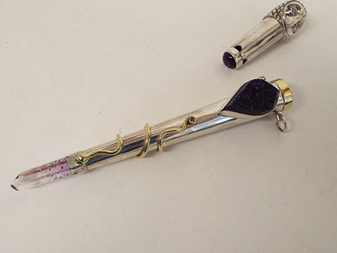 Sterling Silver and 18k gold. Semi precious stones and diamond eyes.